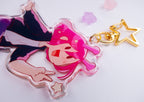 Acrylic charm with ADHD Alien character design on a white background