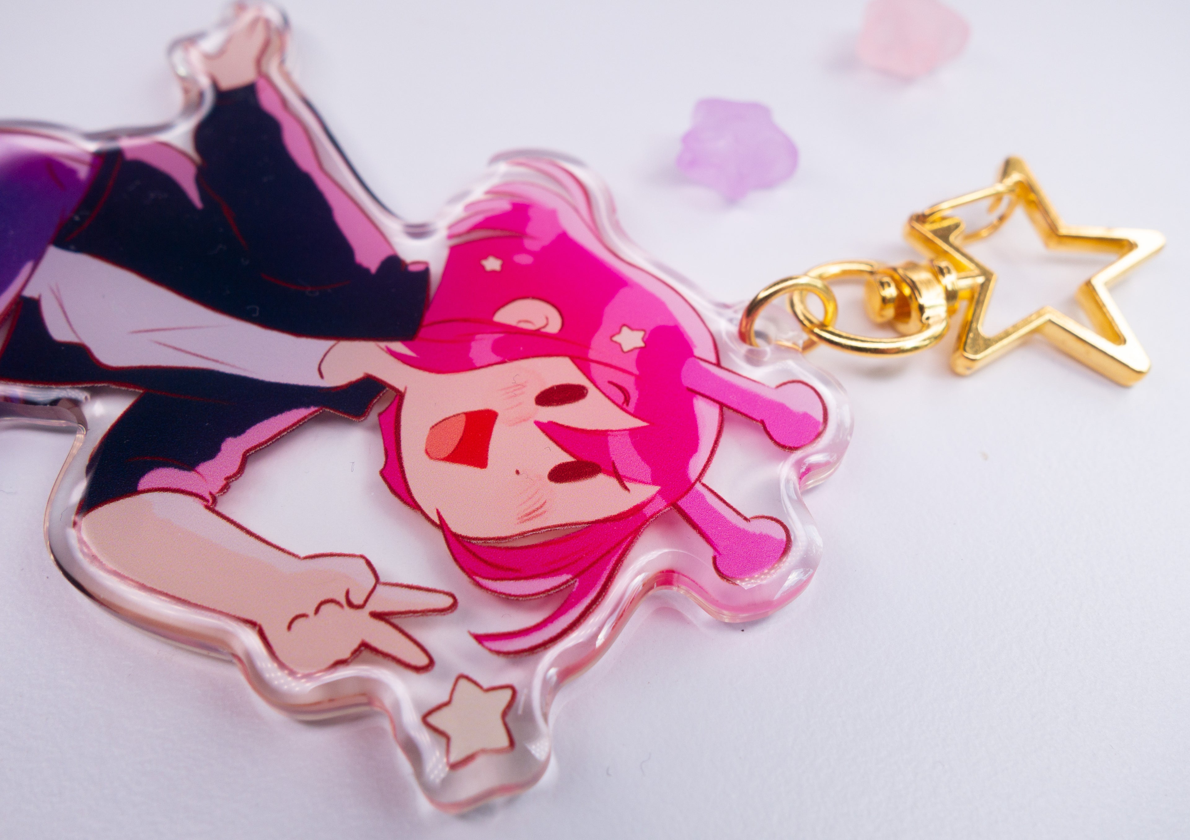 Acrylic charm with ADHD Alien character design on a white background