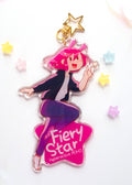 Acrylic charm with pink hair and a star with text Fiery Star on a white background