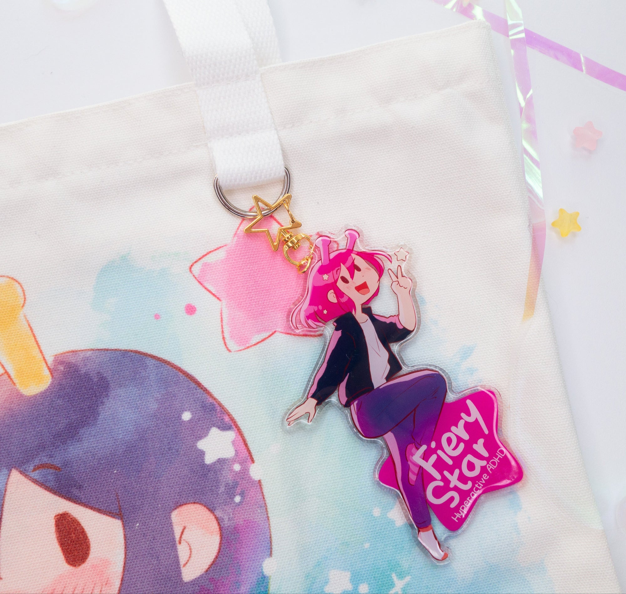 ADHD Alien character keychain with pink hair and purple outfit on a colorful background