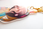 Detail shot of the keychain with the ADHD Alien character design on a white background