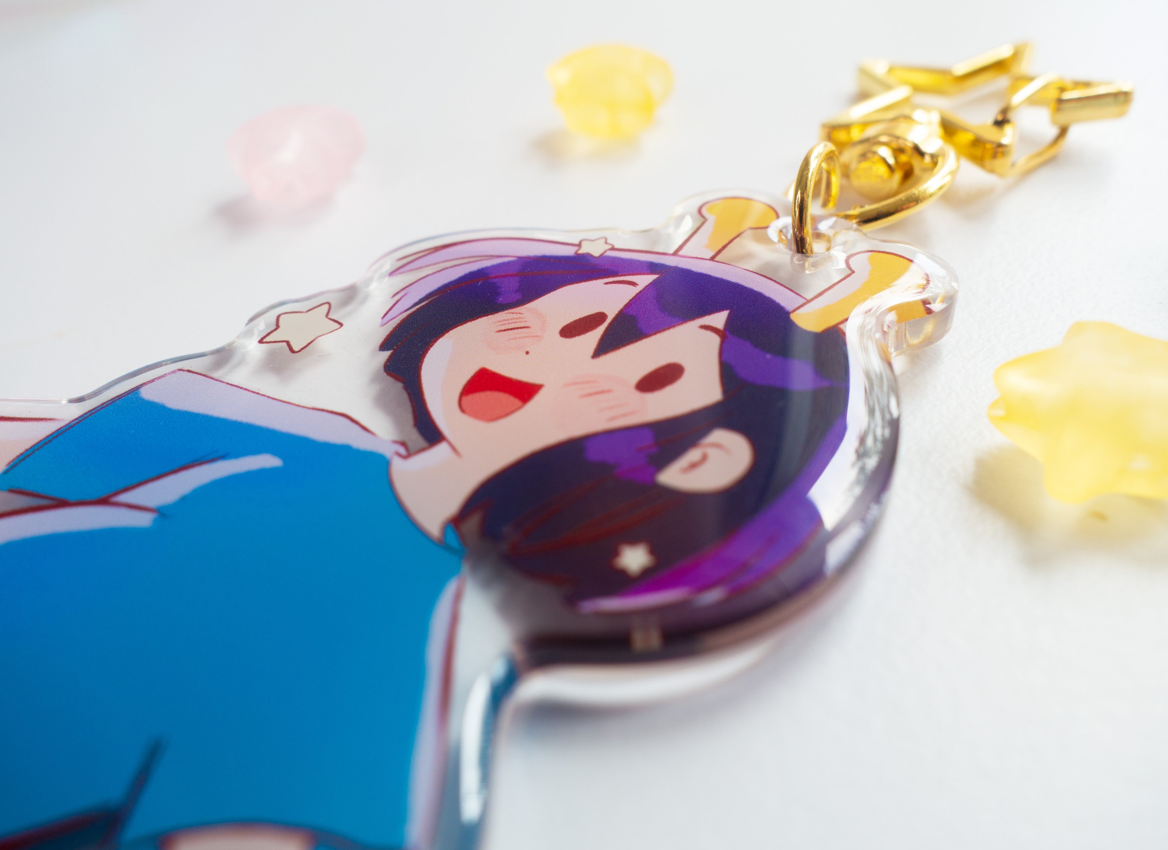 ADHD Alien character acrylic charm with star clasp on a white background